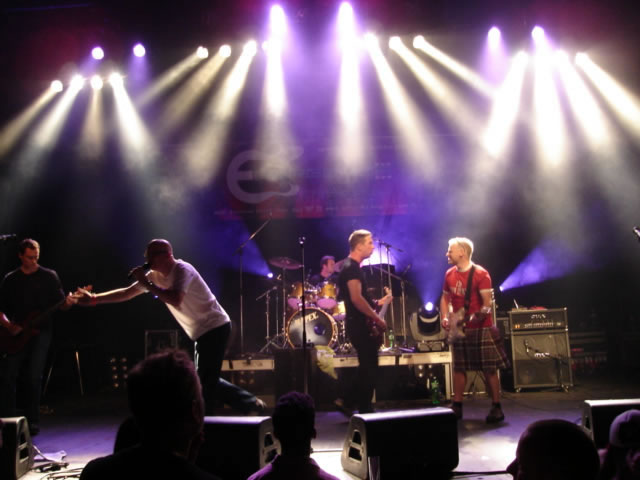 Blue stage lighting and Scottish Saltire detail at Volkshaus Zurich